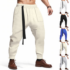 "Men's Casual Ankle-Tied Pants – Loose Fit Elastic Waist Sports Trousers for Everyday Comfort